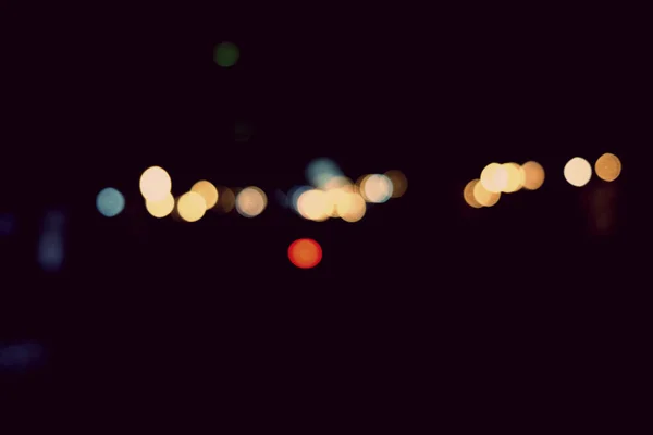 Astratto urbano notte luce bokeh, sfondo sfocato — Foto Stock