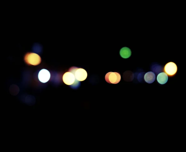 Abstract urban night light bokeh, defocused background — Stock Photo, Image