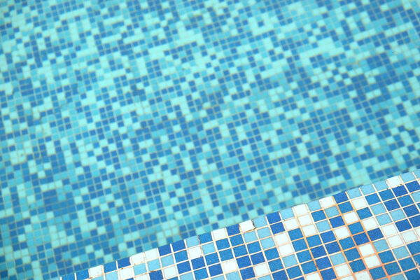 water swimming pool with sunny reflections