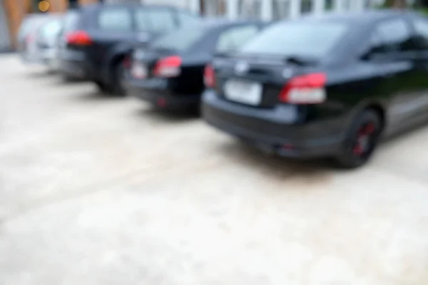 Абстрактні розмиті автомобілі паркування з боке світла Фон — стокове фото