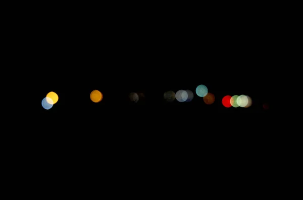 Abstract urban night light bokeh, defocused background — Stock Photo, Image