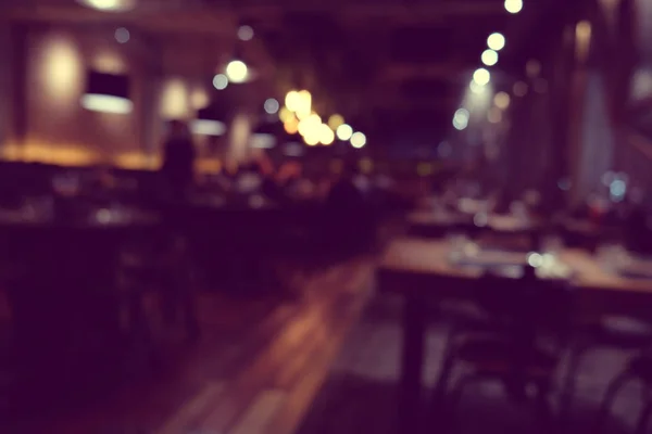 Cafeneaua estompează fundalul cu lumină bokeh cu filtru de epocă — Fotografie, imagine de stoc