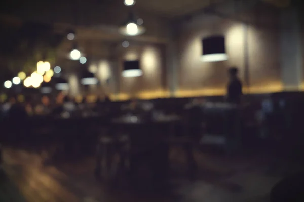 Cafeneaua estompează fundalul cu lumină bokeh cu filtru de epocă — Fotografie, imagine de stoc