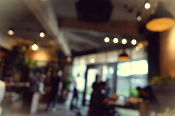 Latar belakang blur shop kopi dengan lampu bokeh dengan filter vintage — Stok Foto