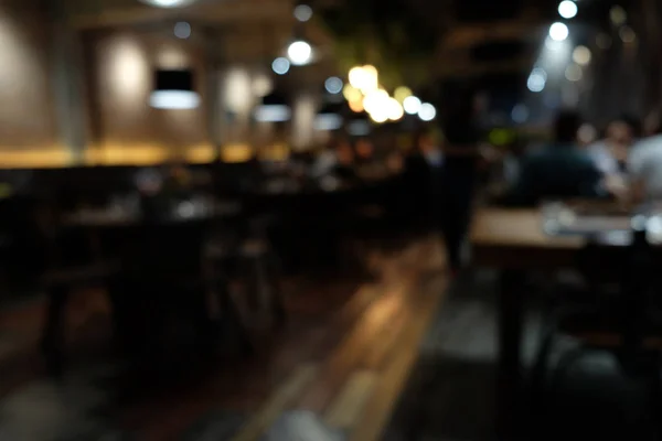 Cafeneaua estompează fundalul cu lumină bokeh cu filtru de epocă — Fotografie, imagine de stoc