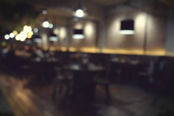 Coffee shop suddig bakgrund med bokeh ljus med vintage filter — Stockfoto