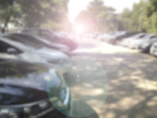 Blured wizerunek samochodów na parkingu na dzień — Zdjęcie stockowe