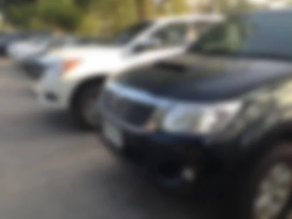 Estacionamento desfocado no exterior com marcação branca — Fotografia de Stock
