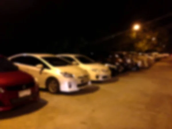 Astratto sfocatura parcheggio auto all'aperto di notte — Foto Stock