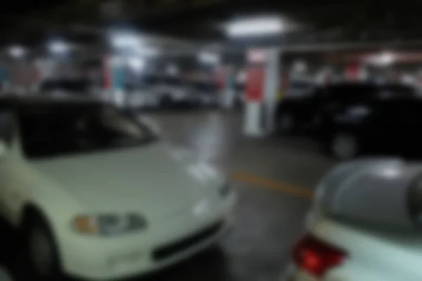 Astratto parcheggio auto sfocatura con luce bokeh sfondo per l'uso di un — Foto Stock