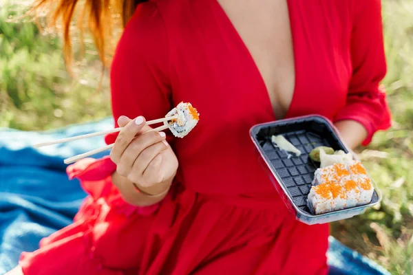 Closeup Sushi Set Food Delivery Sexy Girl Holds Sushi Chopsticks — Stock Photo, Image