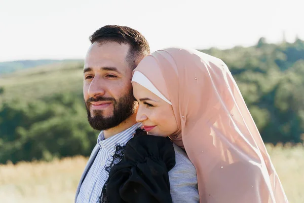 Muslim Love Story Close Mixed Couple Smiles Hugs Green Hills — Stock Photo, Image