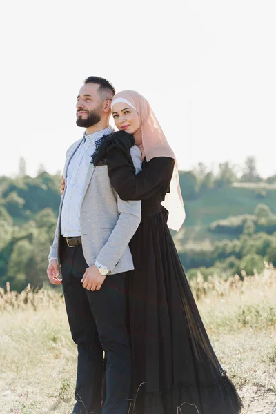 Muslim Love Story Close Mixed Couple Smiles Hugs Green Hills — Stock Photo, Image