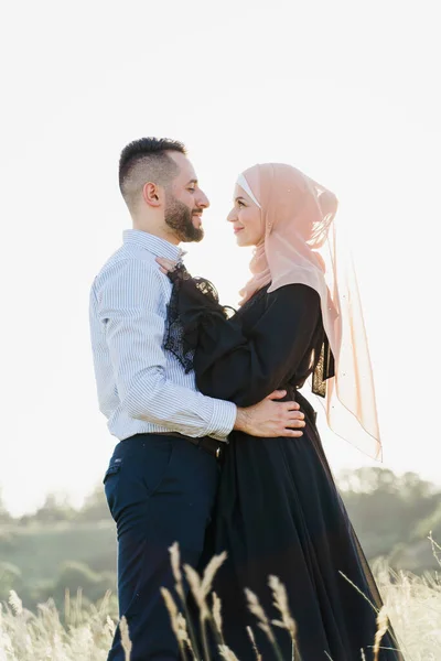 Muslim Love Story Sun Light Mixed Couple Smiles Hugs Sunset — Stock Photo, Image