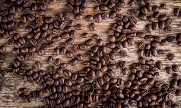 Bruin Gebrande Koffiebonen Houten Tafeloppervlak Kopieer Ruimte — Stockfoto