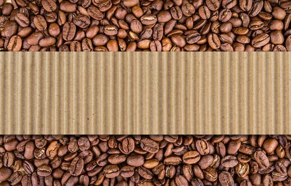 Roasted coffee beans background and carton paper line for copy space
