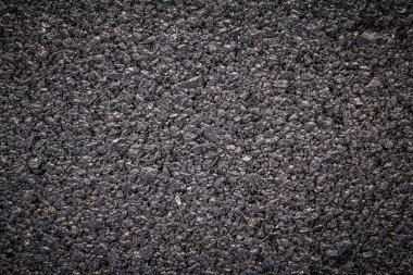 koyu asfalt yol yüzeyinin yakın