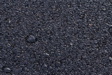 koyu asfalt yol yüzeyinin yakın
