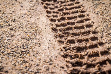 Motosiklet Lastik yolda yazdırma kum seçici odak ile