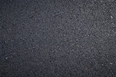 close up of dark asphalt road surface clipart
