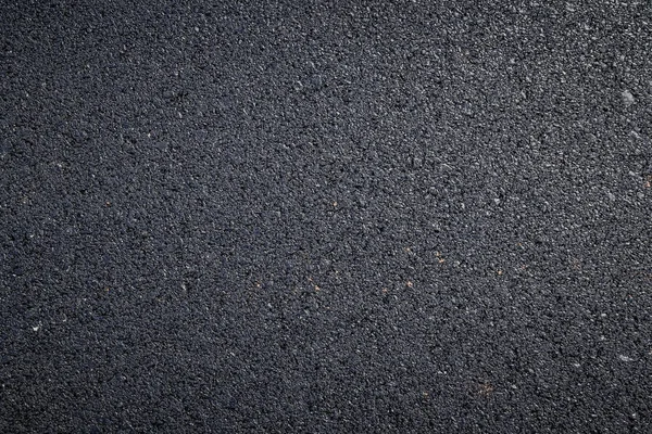 暗いアスファルト路面のクローズアップ — ストック写真