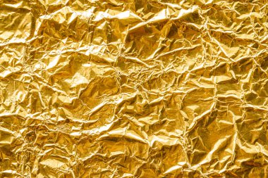 Buruşmuş altın folyo dokusu arkaplanı  