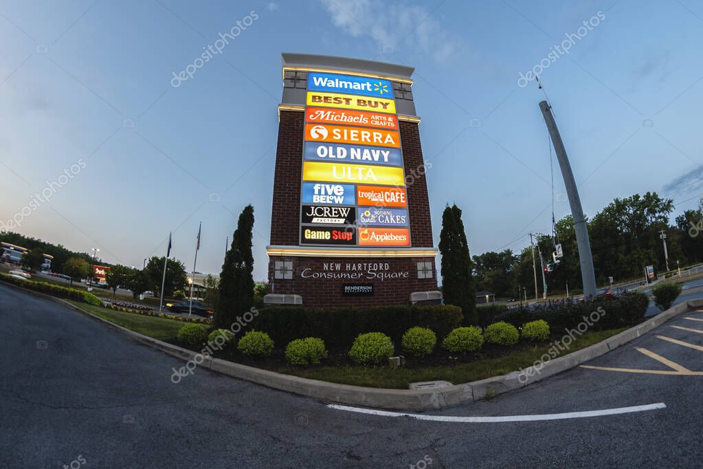 New Hartford, NY - Aug 9, 2025: Night fisheye view of New Hartford Consumer Square pylon sign