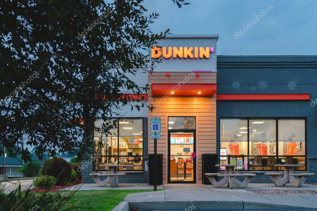 New Hartford, NY - Aug 6, 2025: Dunkin' Donuts is an American coffee and doughnut Co., and quick service restaurant with 12,000 locations in 36 countries, serving more than 3 million customers daily