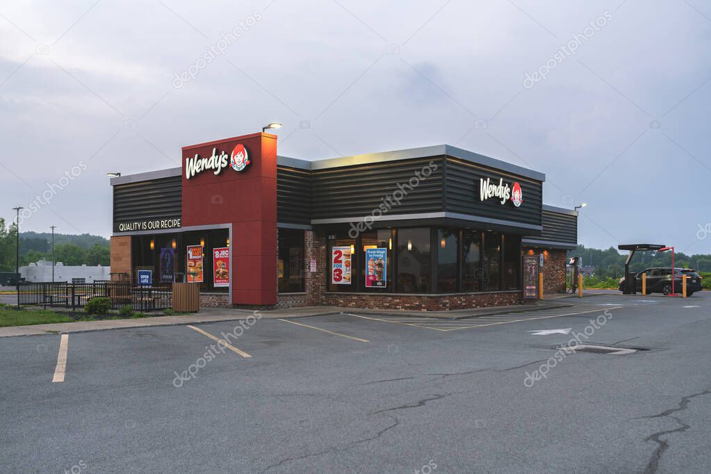 New Hartford, NY - Aug 6, 2025: View of a Wendy's retail location. Wendy's is an international fast food restaurant chain