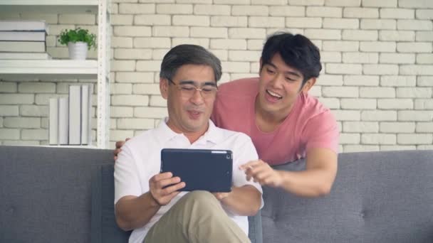 Happy Senior Man Young Man Have Tablet Watching Funny Jokes — Stock Video
