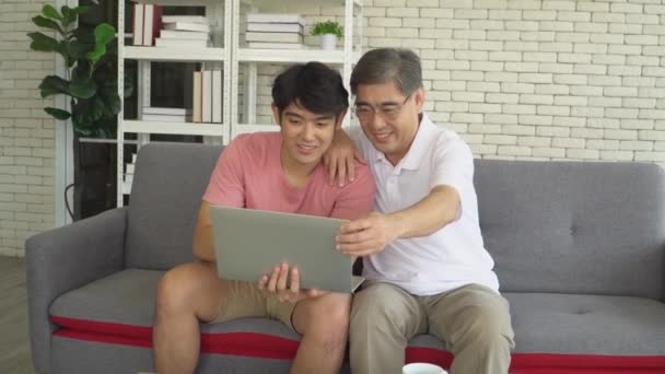 Asian Senior Father Grown Son Using Laptop Computer Video Call — Stock Video