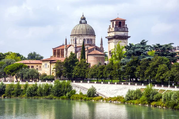 A view of Roman Catholic church San Giorgio in Braida over the Adige River in Verona, Italy