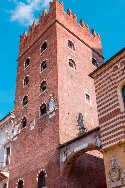 Red Brick Tower of Palace of Cansignorio at Piazza dei Signori in Verona, Italy