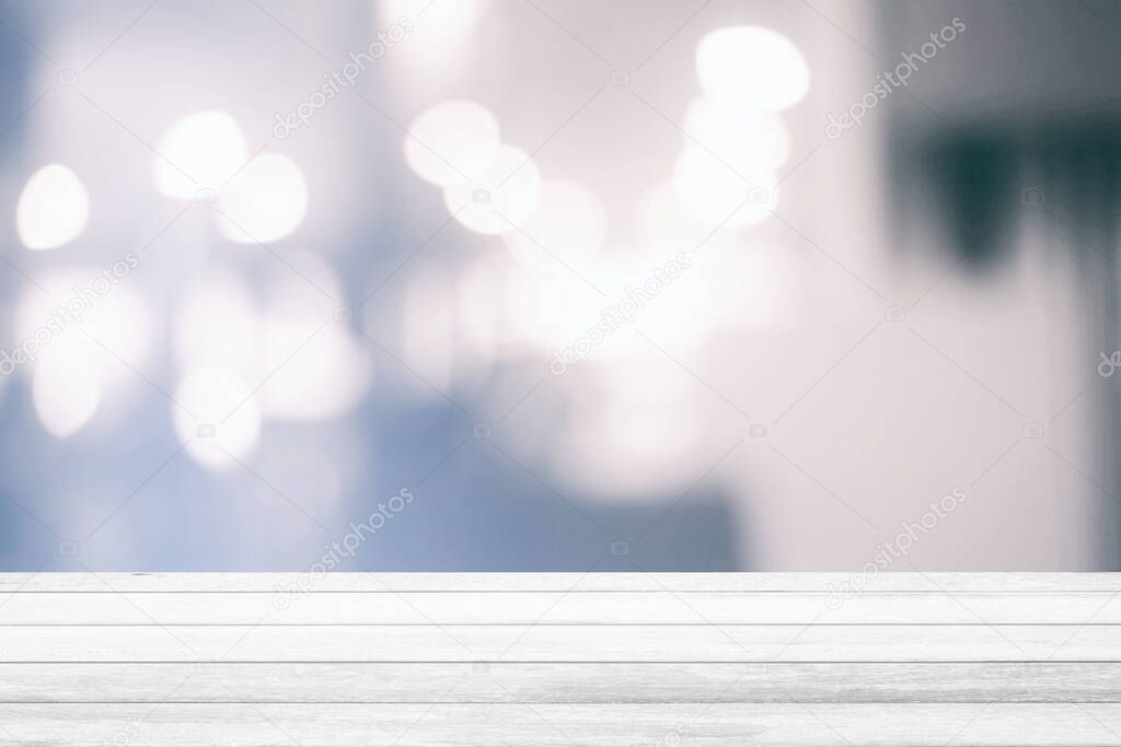 White Wood Table with Blurred White Bokeh Room Background, Suitable for Product Display.