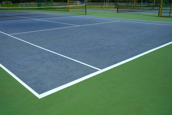 White Line Corner of Tennis Court.