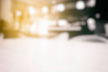 Kafe 'den Beyaz Bulanık Bokeh Işık Sızıntılı Arka plan.