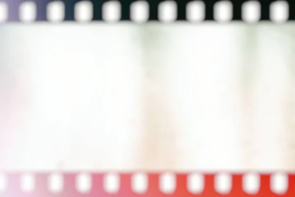 Blurred White Filmstrip Background Red Light Leak — Stock Photo, Image