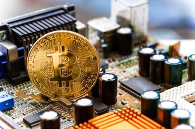 Bilgisayar devre kartı üzerinde Bitcoin / Cryptocurrency kavramı