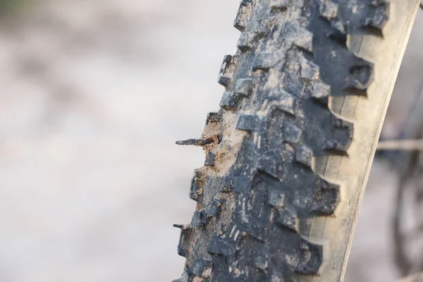 Mountain Bike Tire Rusty Nail Bicycle Puncture Concept — Stock Photo, Image