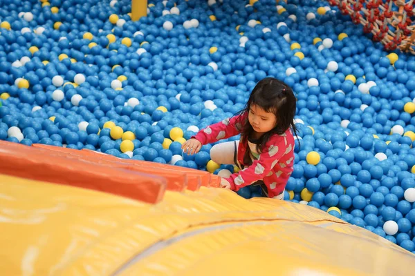 Young Female Kid Playing Ball Pit — Stock Photo, Image