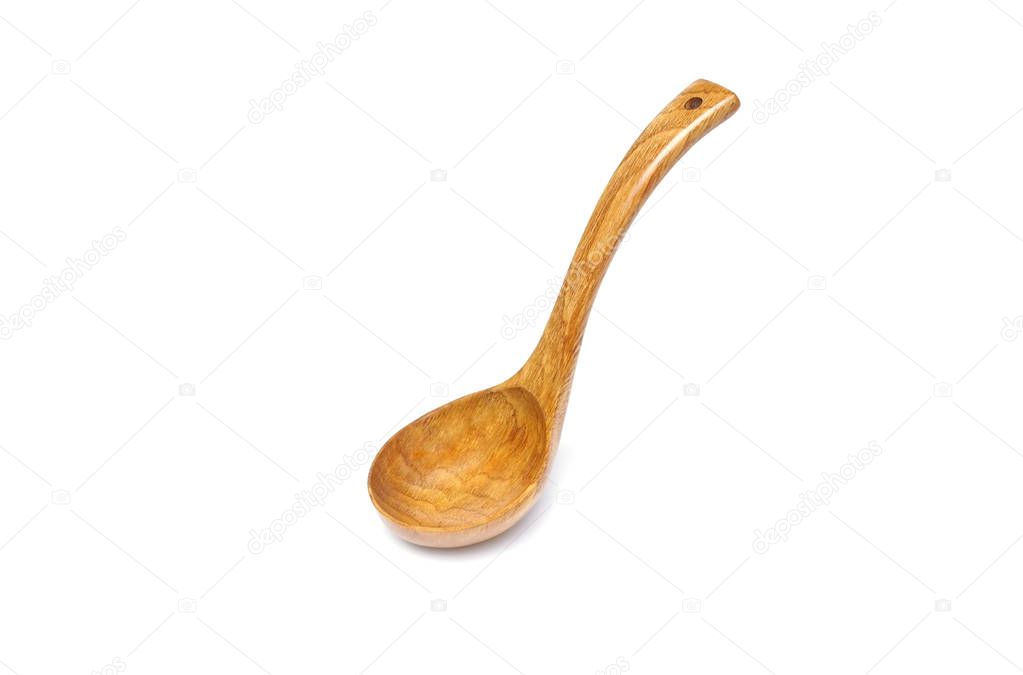Wooden soup spoon isolated on white                          