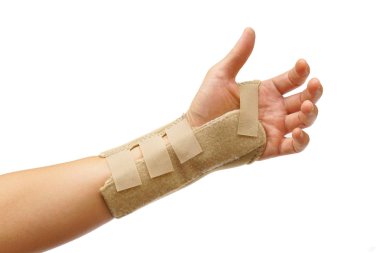 Beyaz izole el bilek tedavisi destek eldiven giymiş bir el                                                               