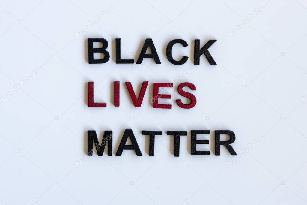 Close up Slogan Black lives matter tag. American Flag.