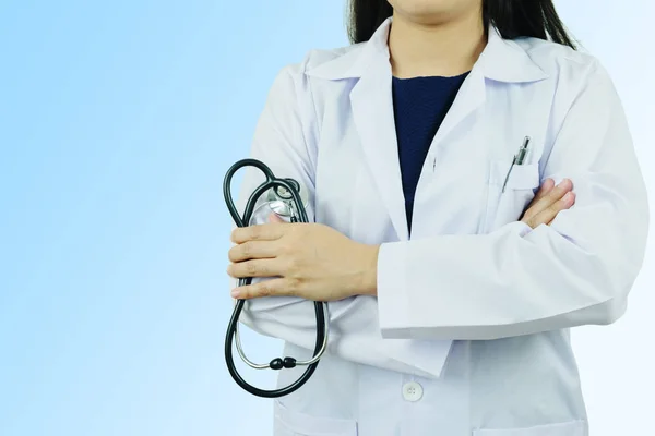 Young woman doctor holding stethoscope — Stock Photo, Image