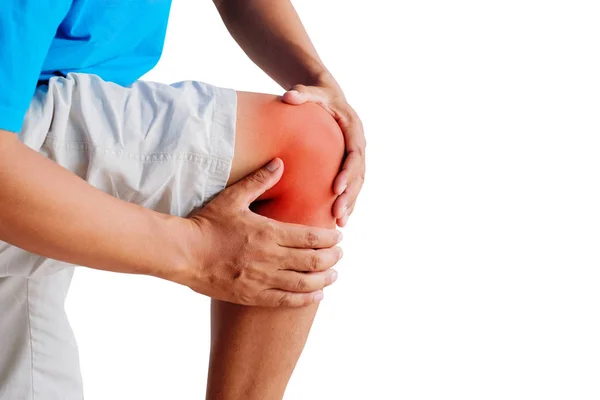 Young Man holds on to the knee, The pain in the knee