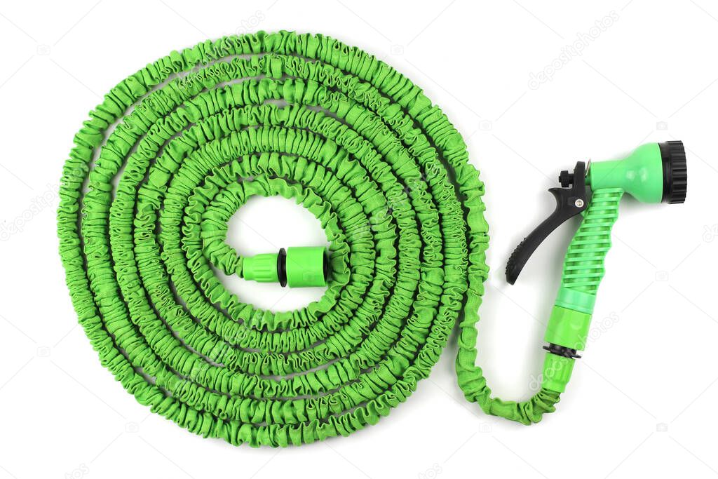 The folded spray hose is insulated on white