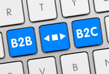 B2B-B2C Metalik Klavyenin Mavi Anahtarı üzerine yazılmış. Parmak tuşuna bas.