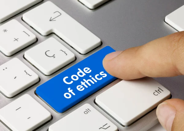 Code Ethics Written Blue Key Metallic Keyboard Finger Pressing Key — Stock Photo, Image