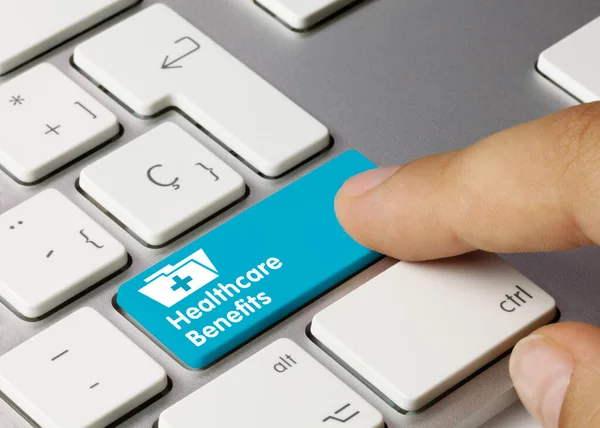 Healthcare Benefits Written Blue Key Metallic Keyboard Finger Pressing Key — Stock Photo, Image