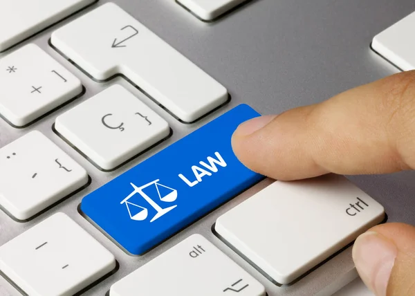 Law Written Blue Key Metallic Keyboard Finger Pressing Key — Stock Photo, Image